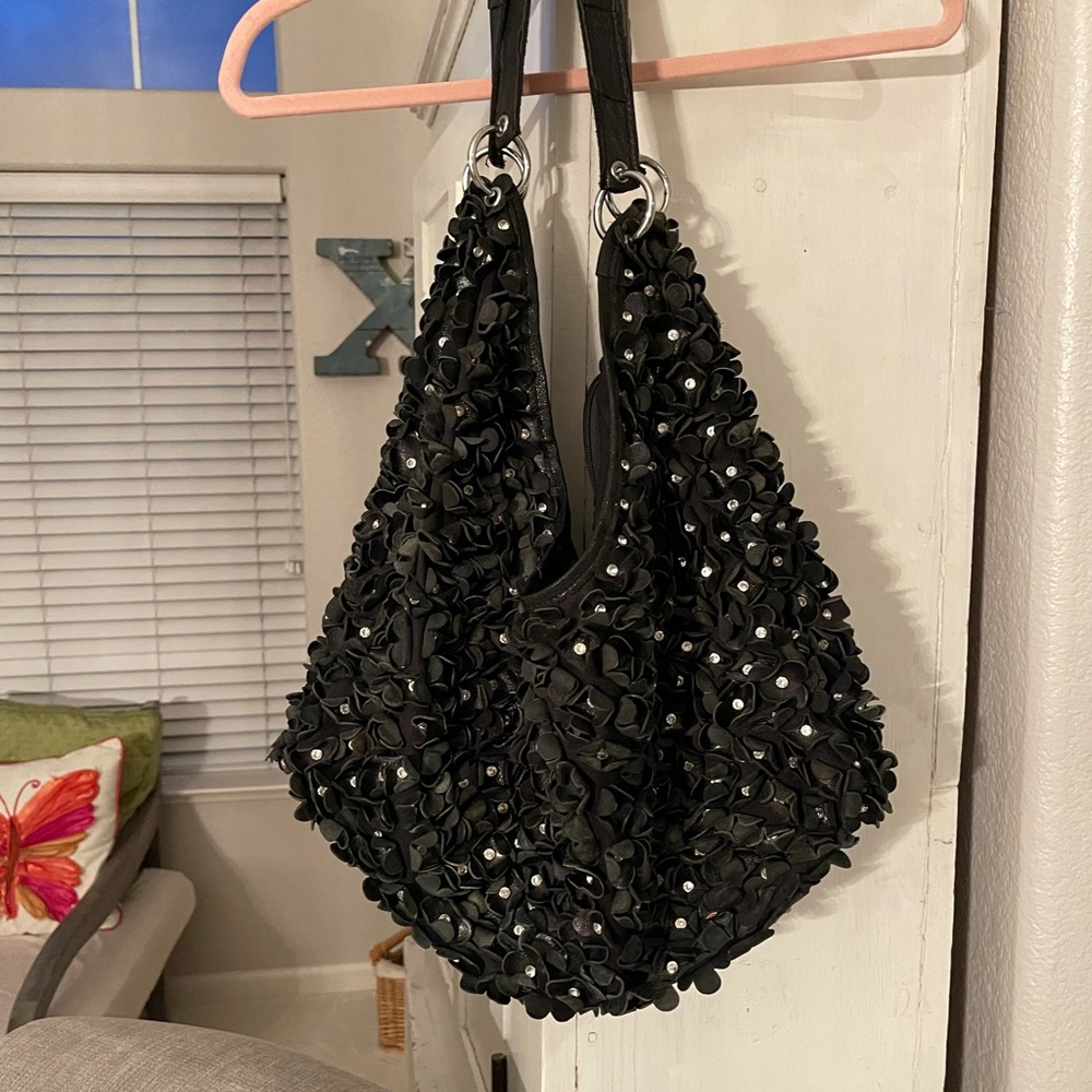 Unique and awesome black leather purse.